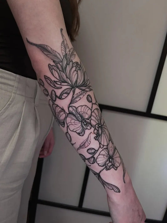 Big Blackwork Chrysanthemum Leaves Tattoo on Women Arm by @little_elm_tattooer