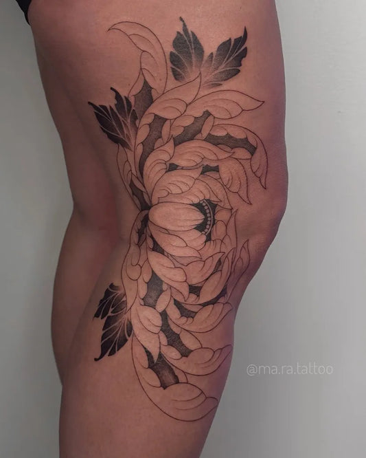 Big Blackwork Chrysanthemum Tattoo on Women Knee by @ma.ra.tattoo