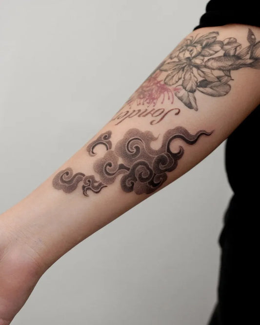 Big Blackwork Cloud Flower Tattoo on Women Arm by @noeyhead2