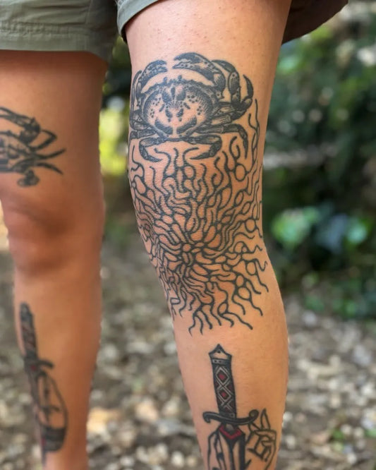 Big Blackwork Crab and Flames Tattoo on Women Knee by @restraint_release