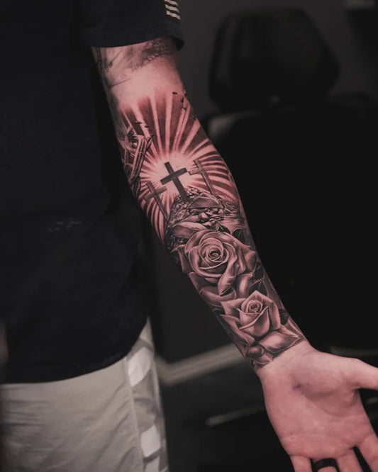 Big Blackwork Cross Roses on Men Arm Tattoo by @aarontorrestattoo