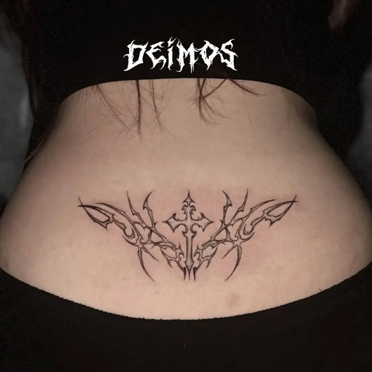 Big Blackwork Cross Wings Tattoo on Women Lower Back by @deimos_tattoo_ph