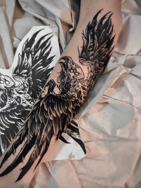 Big Blackwork Crow Phoenix Tattoo on Women Arm by @vitormartinsxtattoo