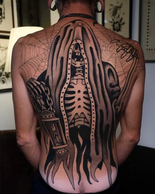 Big Blackwork DeathFigure with Lantern on Men Back Tattoo by @ros.tt