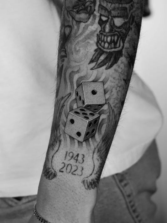 Big Blackwork Dice and Skull Tattoo on Men Arm by @zando.ttt