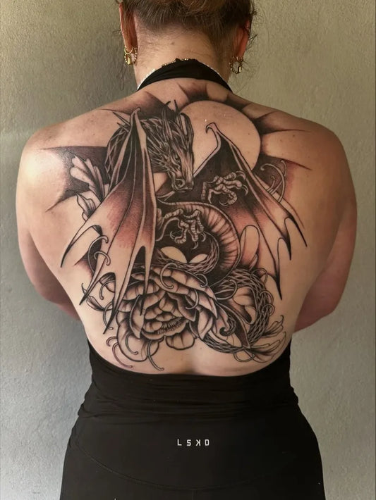Big Blackwork Dragon Moon and Flowers on Women Back Tattoo by @halfasleeptattoos