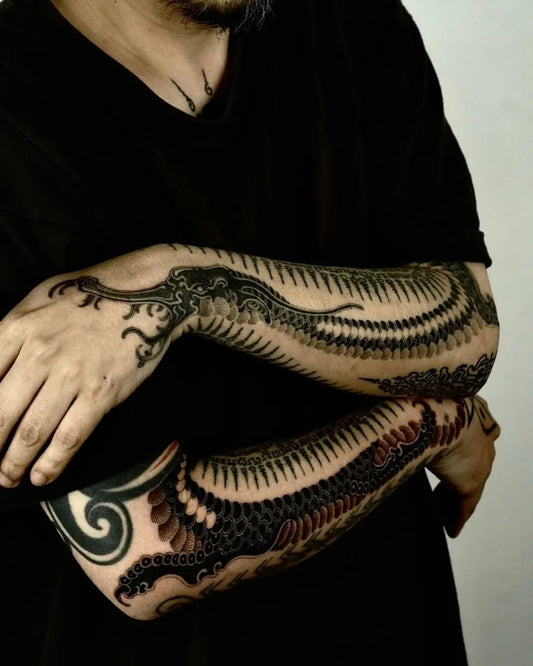 Big Blackwork Dragon Tattoo on Men Arm by @tattooculturemag