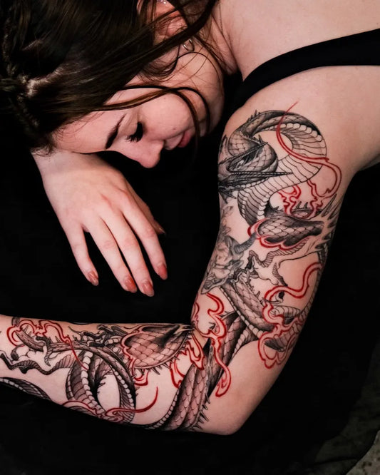 Big Blackwork Dragon Tattoo on Women Upper Arm by @haen_tt