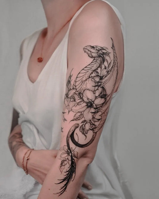 Big Blackwork Dragon and Flowers on Women Arm Tattoo by @inlove.tattooer