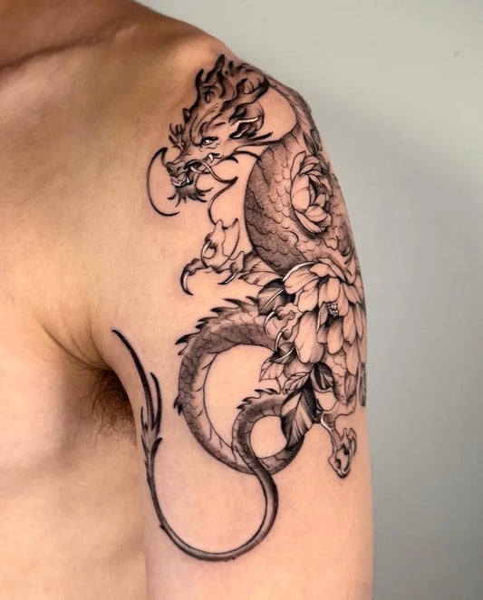 Big Blackwork Dragon and Lotus Tattoo on Men Shoulder by @maayan.tatt