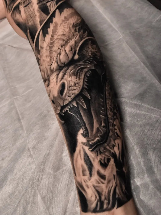 Big Blackwork Dragon on Men Arm Sleeve Tattoo by @thehantattoo