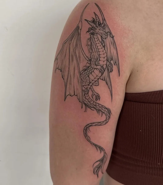 Big Blackwork Dragon on Women Arm Tattoo by @maggieangulotattoo