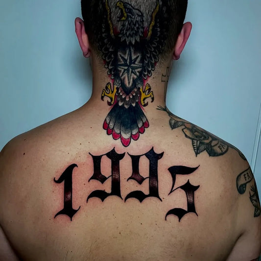 Big Blackwork Eagle Number Tattoo on Men Back by @tattoobymarco_bettoja