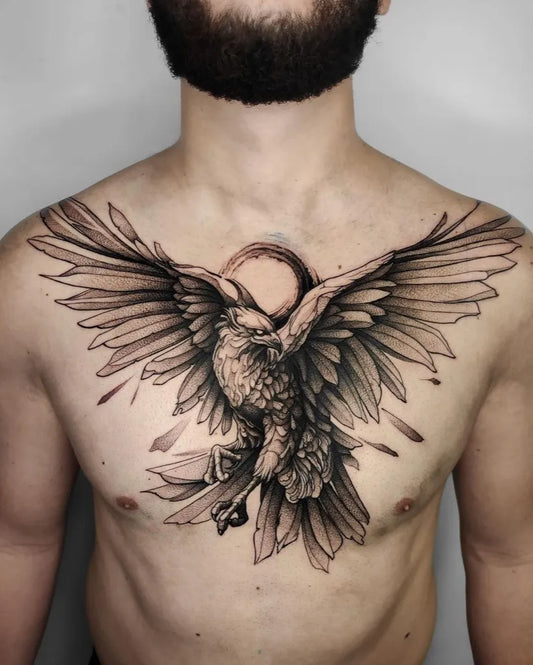 Big Blackwork Eagle with Halo on Men Chest Tattoo by @no.regrets.studios