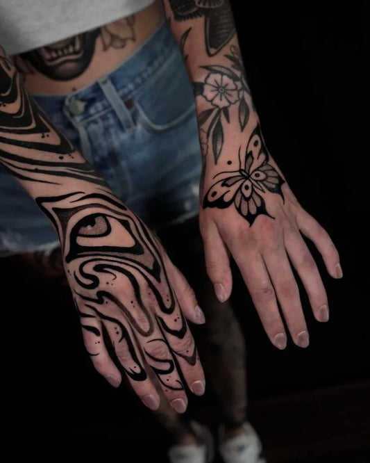 Big Blackwork Eye Butterfly Tribal Patterns on Women Hands Tattoo by @satanischepferde