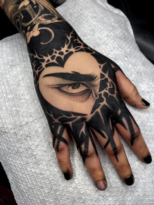 Big Blackwork Eye Heart Web on Women Hand Tattoo by @barontattoo.666