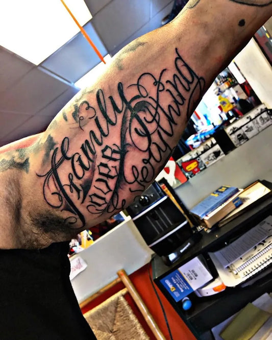 Big Blackwork Family Banners Tattoo on Men Bicep by @inkedbyimani