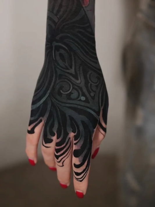 Big Blackwork Feather Tattoo on Women Hand by @blackonblacktattoo