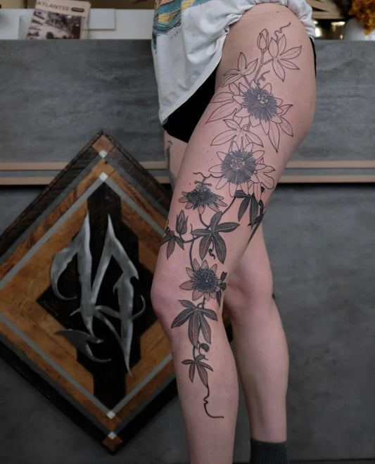 Big Blackwork Flowers and Vines on Women Leg Tattoo by @jeridobsontattoos__