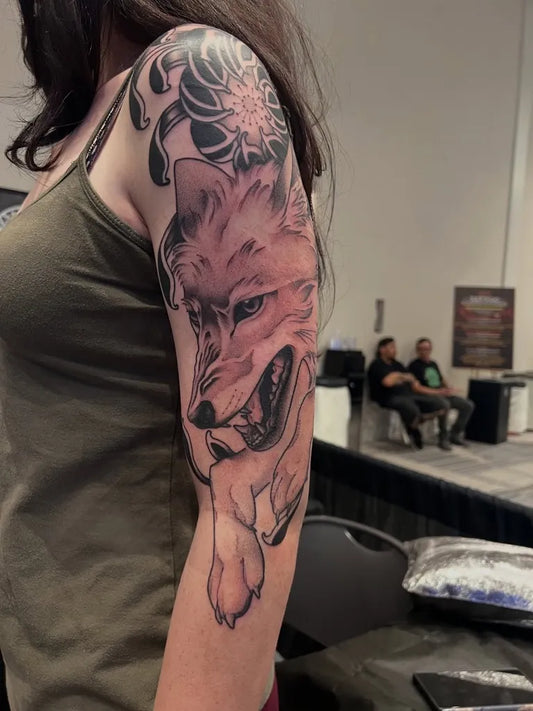 Big Blackwork Fox and Chrysanthemum Nature Tattoo on Women Arm by @pamsanderstattoo