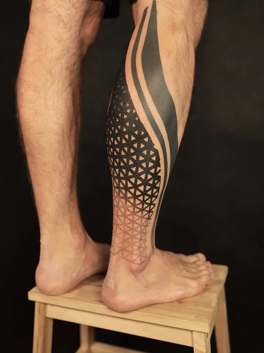 Big Blackwork Geometric Pattern Tattoo on Men Calf by @ishta_tattoo