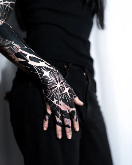 Big Blackwork Geometric Starburst Tattoo on Women Arm by @blxsj