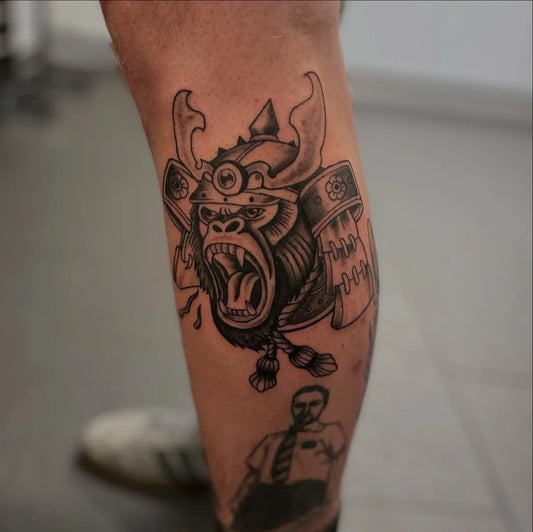 Big Blackwork Gorilla Samurai Tattoo on Men Leg by @blue_magoo_tattoo