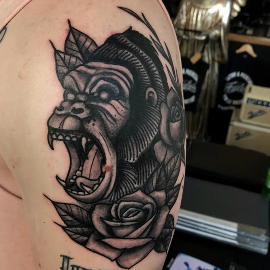 Big Blackwork Gorilla and Rose Tattoo on Men Shoulder by @maroentattooer