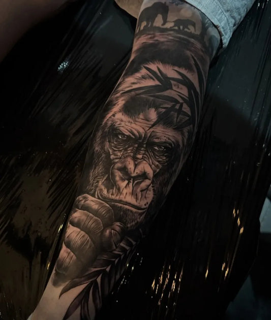 Big Blackwork Gorilla with Bamboo Tattoo on Men Leg by @sarahjanetattoo