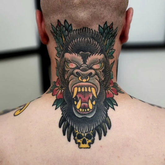 Big Blackwork Gorilla with Flowers and Skull Tattoo on Men Neck by @marcin_ch_tattoo
