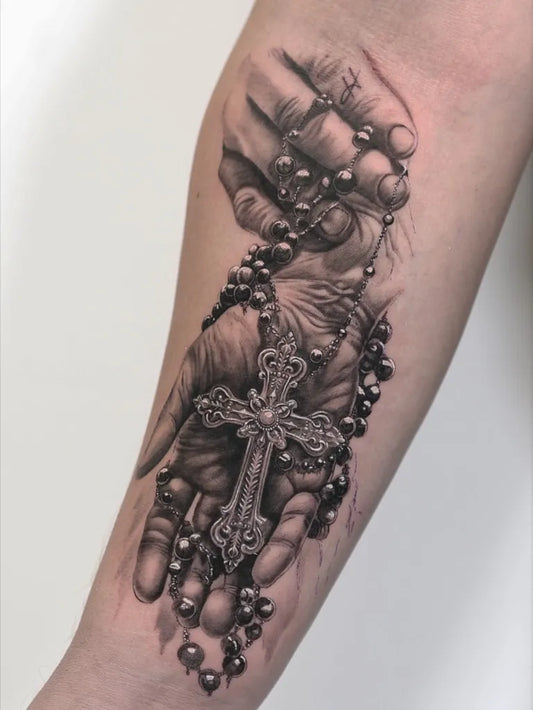 Big Blackwork Hands Rosary Cross on Men Arm Tattoo by @boki.tattoo