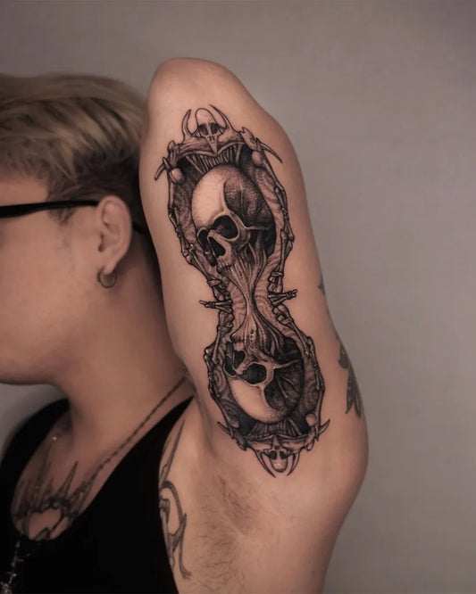 Big Blackwork Hourglass Skull Tattoo on Women Arm by @aweichen666_tattoo