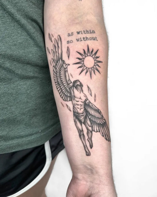 Big Blackwork Icarus with Sun and Wings on Men Arm Tattoo by @mercyraintattoos