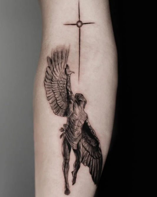 Big Blackwork Icarus with Wings and Cross on Men Arm Tattoo by @t.a.e_t