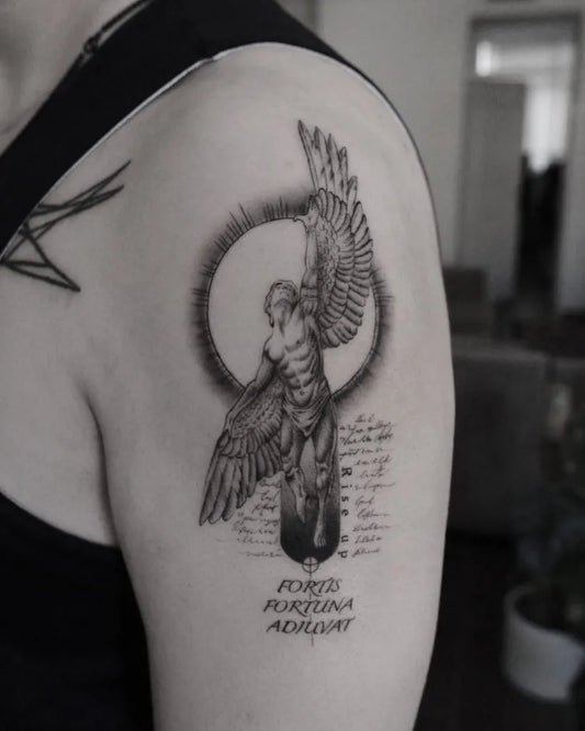 Big Blackwork Icarus with Wings and Sun on Women Shoulder Tattoo by @p.tattooart33