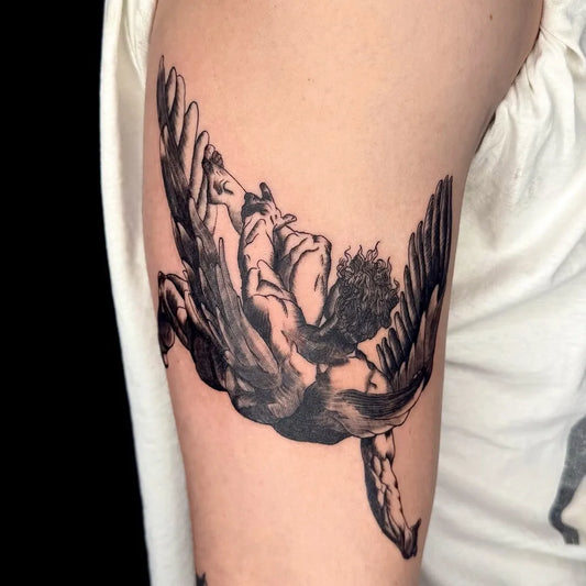 Big Blackwork Icarus with Wings on Men Arm Tattoo by @yohanb_tattoo