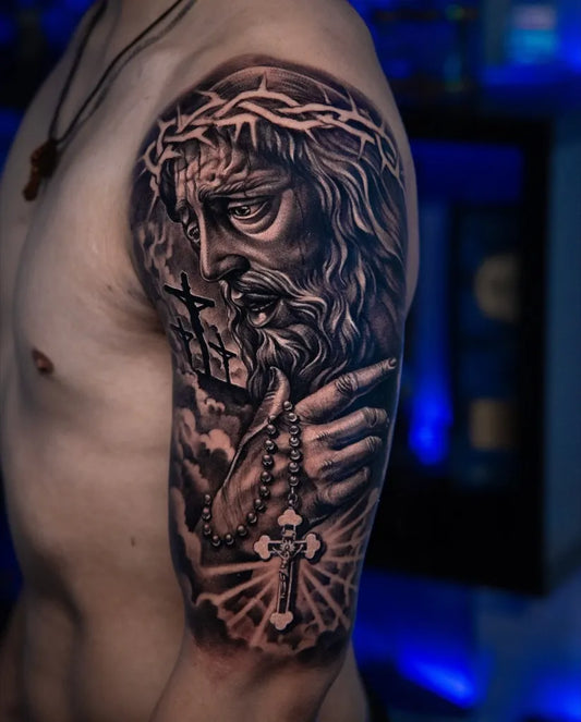 Big Blackwork Jesus Cross Rosary on Men Arm Religious Tattoo by @tigran.ink