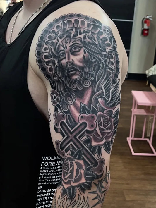 Big Blackwork Jesus Cross Roses on Men Arm Religious Tattoo by @declantattoos