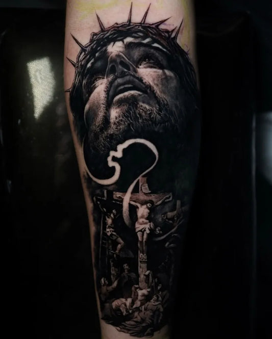 Big Blackwork Jesus Crucifixion on Men Arm Religious Tattoo by @gabrielvtattoos