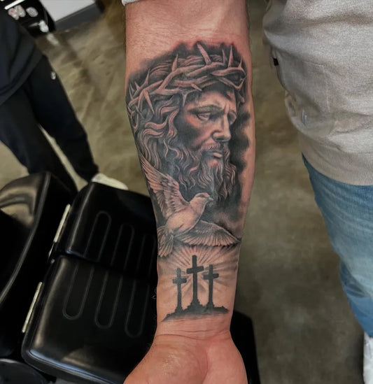 Big Blackwork Jesus Dove Crosses on Men Arm Religious Tattoo by @skerrybrownie