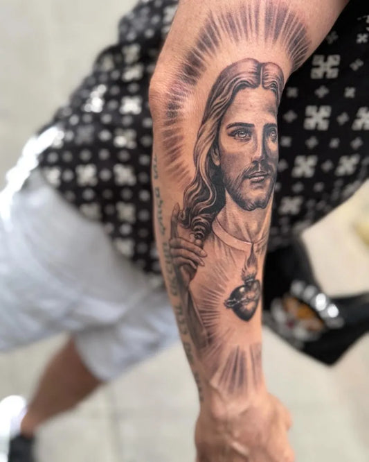 Big Blackwork Jesus Sacred Heart on Men Arm Religious Tattoo by @michaeldecorte