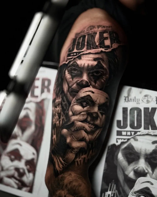 Big Blackwork Joker portrait and newspaper on Men Arm Tattoo by @brunocoelho_tattoo