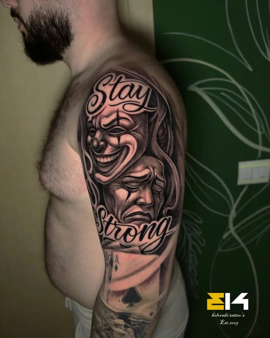 Big Blackwork Laughing Crying Masks Stay Strong on Men Arm Sleeve Tattoo by @kolorado_tattoos