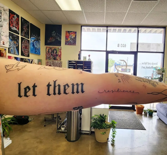 Big Blackwork Let Them Resilience Birds on Women Arm Tattoo by @renrobot.art