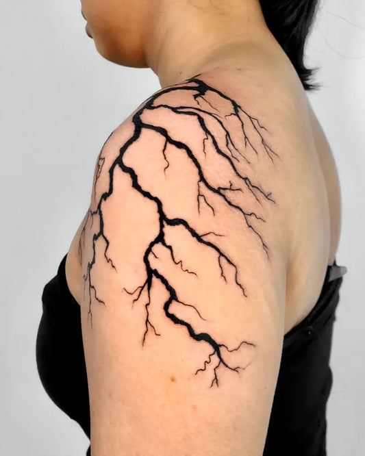 Big Blackwork Lightning Branches Tattoo on Women Shoulder by @lano.ink