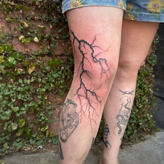 Big Blackwork Lightning Heart Snake Tattoo on Women Thigh by @elfeeart