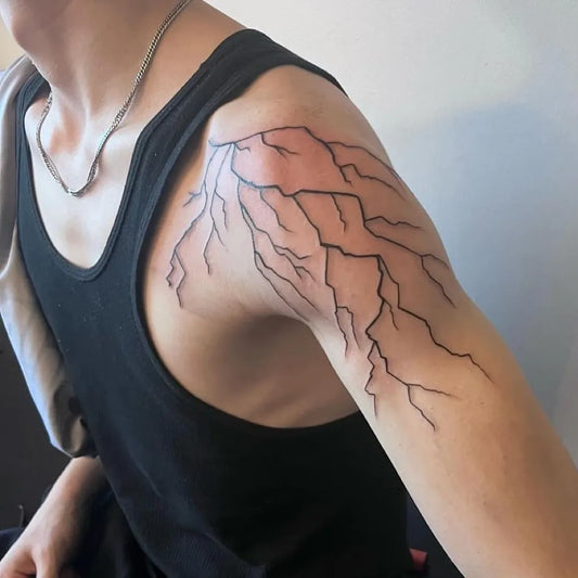Big Blackwork Lightning Tattoo on Men Shoulder by @ferguson_tattoos