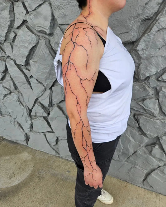 Big Blackwork Lightning Tattoo on Women Arm by @bethany_sasaki