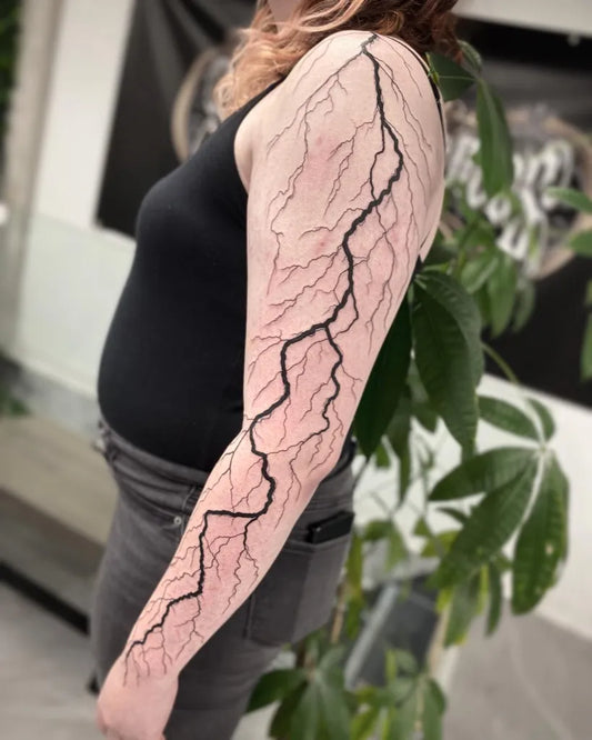 Big Blackwork Lightning Tattoo on Women Arm by @natts_tatts