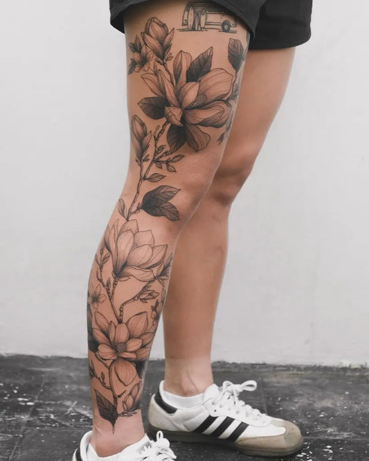 Big Blackwork Magnolia Vines on Women Leg Tattoo by @artfulinkbali